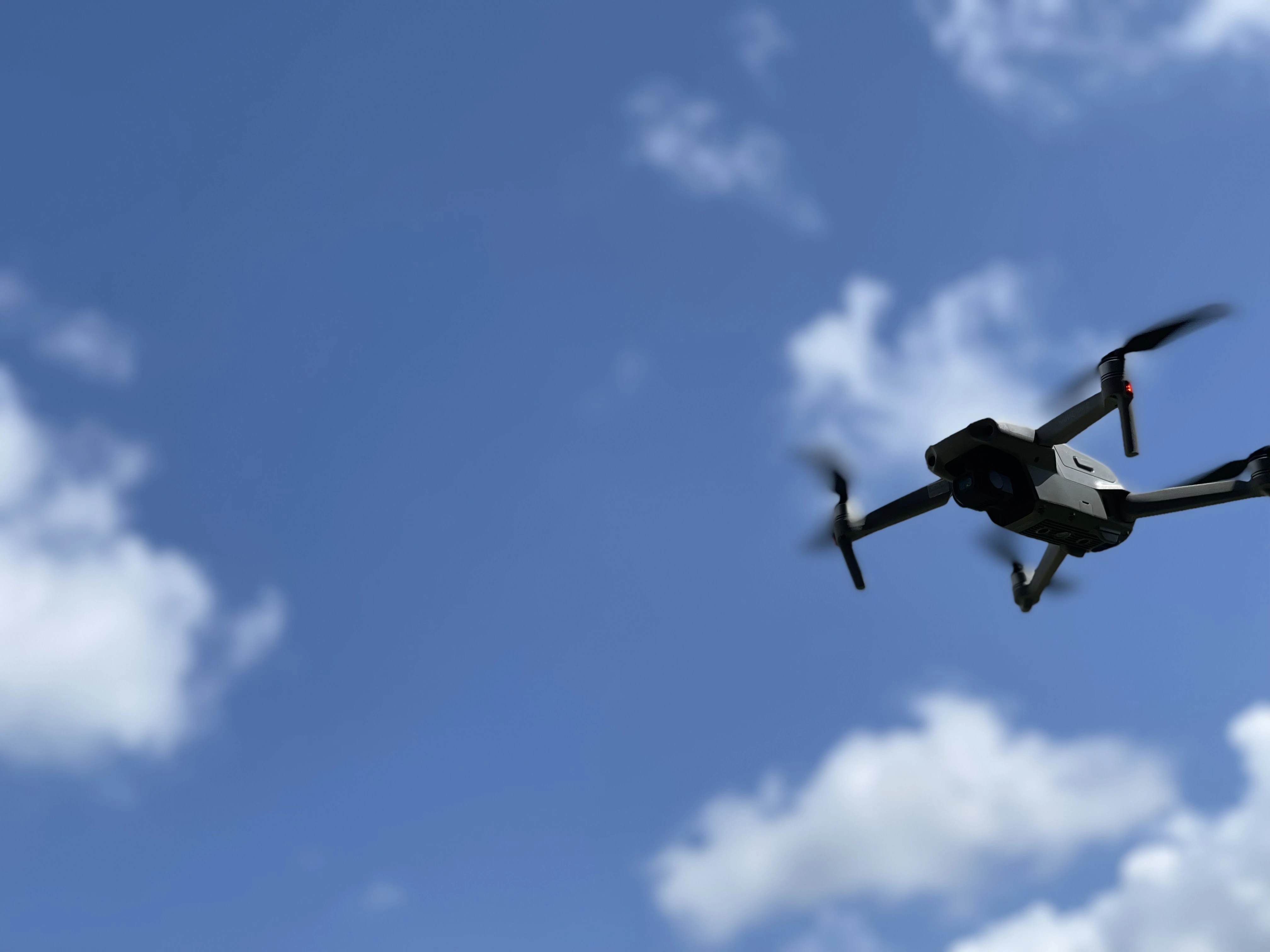 Portrait image of a drone in midair